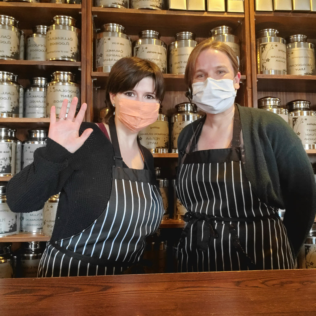 Two employees saying hello